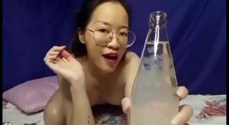 Cute Girl Drinking Water At Home